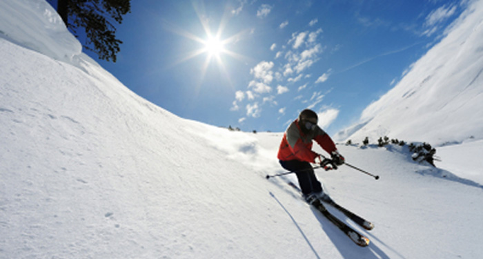 Skier skiing on slopes